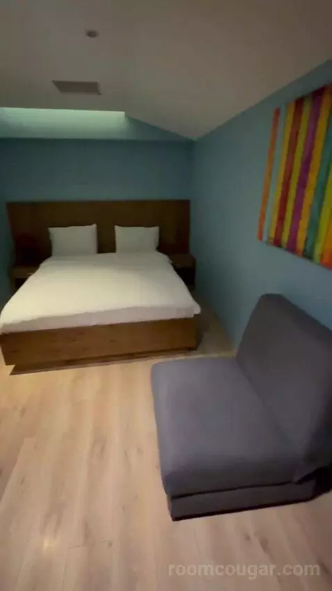 Deluxe Room with Kitchenette (#213) bed picture #3