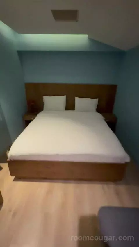 Deluxe Room with Kitchenette (#213) bed picture #4