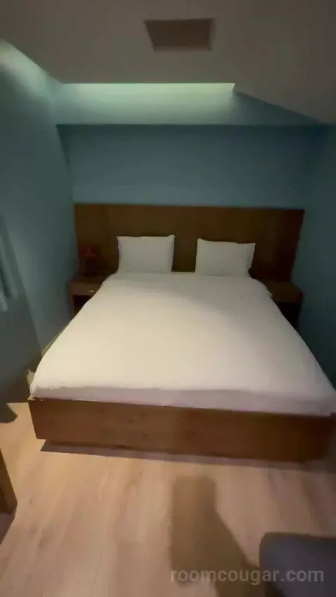 Deluxe Room with Kitchenette (#213) bed picture #5