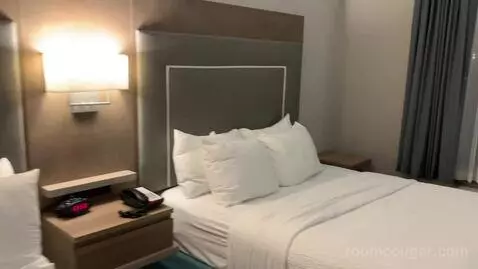 Queen Room with Two Queen Beds and Sofa Bed (#127) bed picture #6