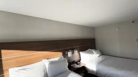 Queen Room with Two Queen Beds (#310) bed picture #8