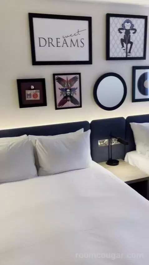 Queen Room with Two Queen Beds (#305) bed picture #12