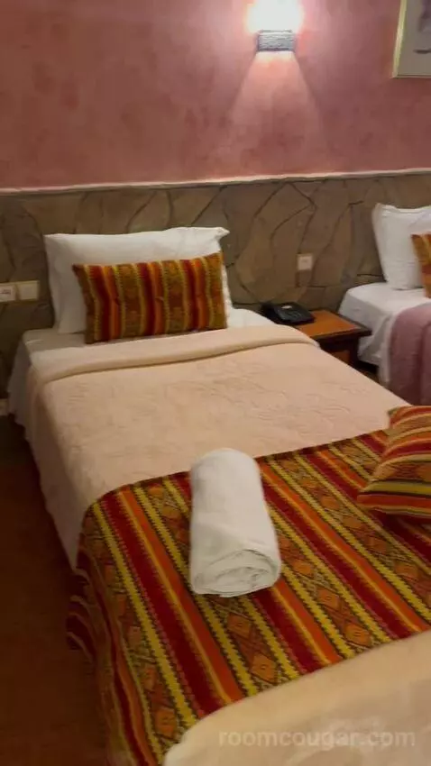 Standard Triple Room (#214) bed picture #2