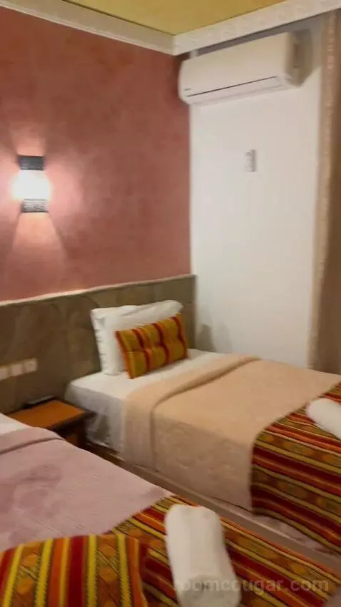 Standard Triple Room (#214) bed picture #5