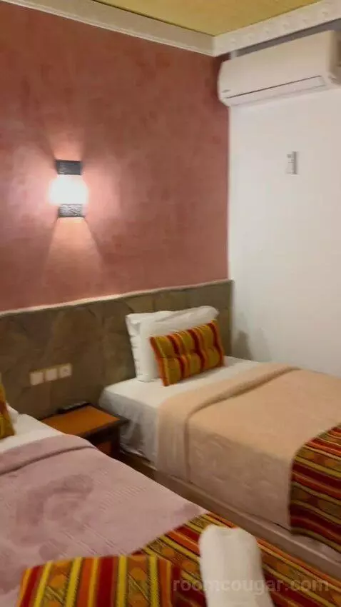 Standard Triple Room (#214) bed picture #6